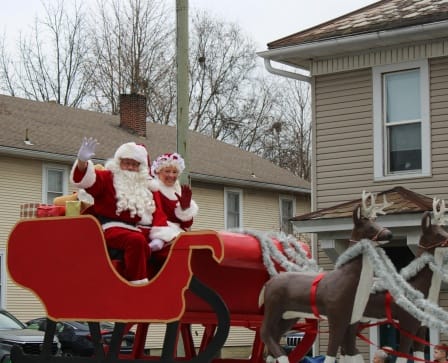 Santa Claus in a sleigh pulled by reindeer